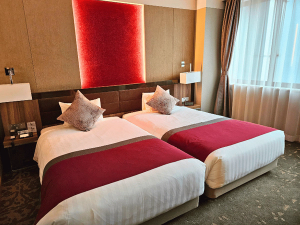 Zimmer im einfachen Hotel in Noboribetsu, Japan