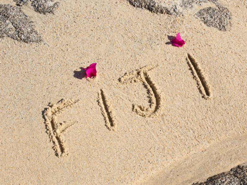 Name in den Sand gemalt Ozeanien