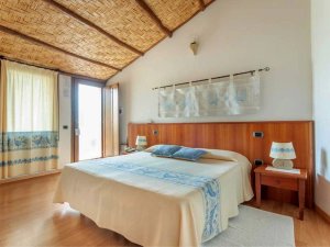 Schlafzimmer im Hotel bei Cabras